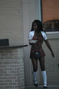 Sexy ebony Tilted Kilt employee in her uniform