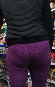 Milf shopping with a nice ass in purple leggings