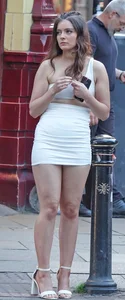 Cute teen in very short white dress w/ visible nips- busted