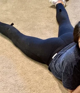 Girl Lying on Her Stomach on the Floor in Tights with Spread Legs Creepshot