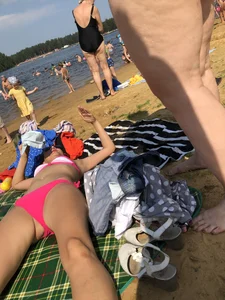 Girl in a Pink Swimsuit Lying on a Beach With Spread Legs Creepshots Collection