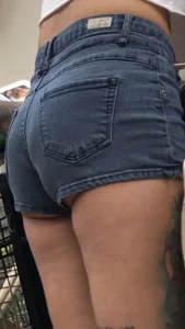 Slim tatted succubus in cheeky jean shorts