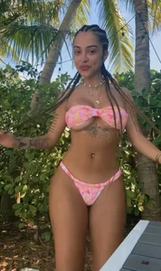 Milf in tight grey jeans and knee high boots with enormous heels, then in swimsuit