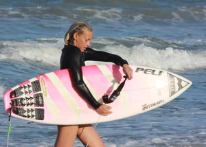 Hot surfer chicks out in the water