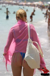 Beach voyeur girls in bikinis, thongs and topless