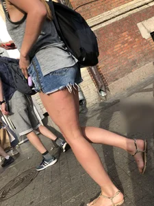 Girl in Denim Mini Shorts and Sandals With Sexy Legs And Feet Street and Subway Photos