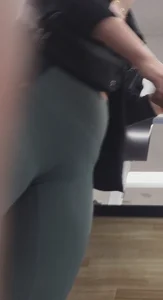 Green Lululemons Bent Over at Fedex
