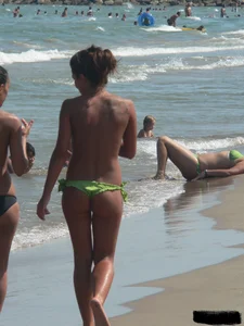 Bunch of sexy babes at the beach in thong bikinis