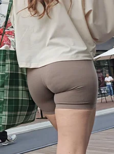 Booty in light brown biker shorts