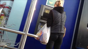 Blonde lady at the atm in tight leggings with a sweet ass