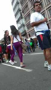Girl out with a friend in purple leggings with a nice ass and slight vtl