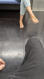 Feet of a subway candid girl in sandals creepshots