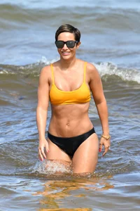 Frankie Bridge nip slips in a bikini on the beach