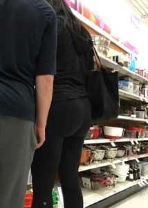 Big booty brunette milf shopping in leggings