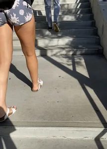 Girl with Long Tanned Legs in Mini Shorts and Sandals Street Creepshot