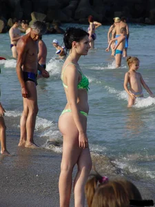 Beach voyeur girls in bikinis, thongs and topless