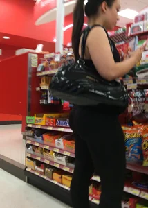 Big assed brunette in leggings at Target