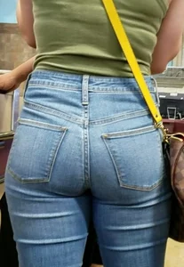 Girl in tight jeans in line. Girls with great asses always can go in front of me