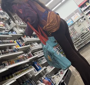Brunette in maroon flare leggings