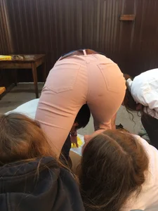 Girl in Tight Jeans Bend Over Playing Twister