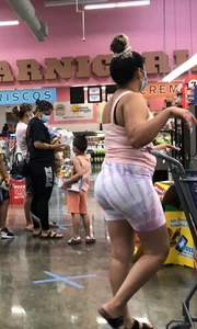 Thick Latina babe with a nice ass in tight patterned shorts