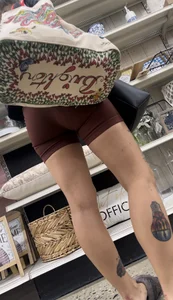 Cute girl in maroon shorts