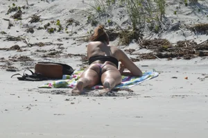 Girl in Swimsuit With Awesome Booty Lying on a Beach Photo