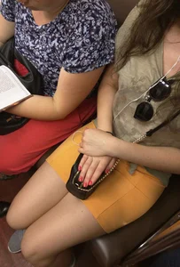 Very Cute Girl in Shorts Sitting in a Subway Train Creepshots Gallery