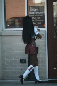 Sexy ebony Tilted Kilt employee in her uniform