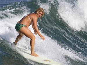 Candid surfer babes on the beach and in bikinis