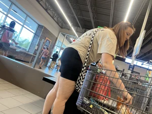 Milf in black biker shorts and flip flops