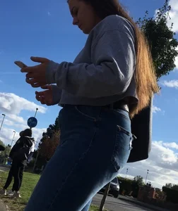 Long haired beauty teen with a tight ass in jeans