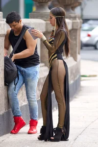 Sexy brunette in hot costume outfit