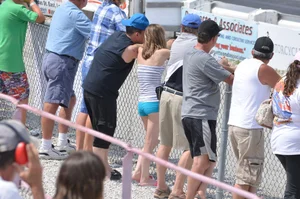 Skinny babe with a cute little ass in tiny blue shorts