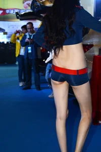 Girl in a Top and Mini Shorts - Expo Model Creep