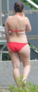 Thick babe in the backyard in red bikini