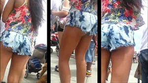 Hot ass brunette in short denim shorts showing her nice ass cheeks
