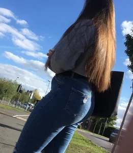 Long haired beauty teen with a tight ass in jeans