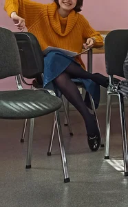 Candid Teen Black Pantyhose And Denim Skirt Sitting With Her Slim Legs Crossed