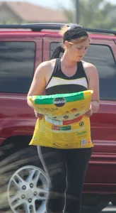 Redhead milf with a nice ass and vtl in leggings while loading her car