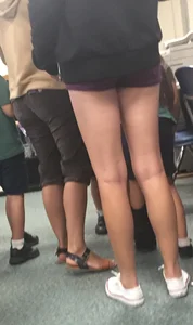 Sweet Legs And Ass in Mini Shorts Closeup Photo