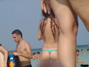 Sexy candid topless and nude beach girls