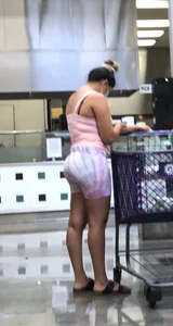 Thick Latina babe with a nice ass in tight patterned shorts