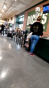 Milf with a nice ass in tight blue leggings at Dick's