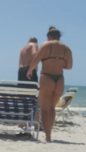 Two girls in thongs at the beach (OC)
