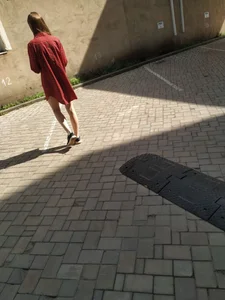 Girl with Thin Legs in a Long Shirt Street Candid Photo