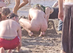 Only one is nude - group photos where only 1 girl is naked, and the rest of the people are dressed