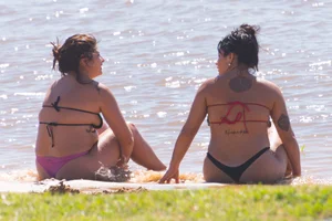 Candid beach girls in thongs