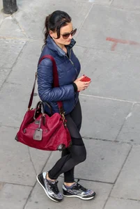 Brunette lady in leggings out walking