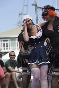 Girl in sailor costume flashes her tits quickly